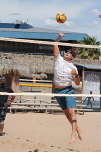Beach ParaVolley for Armed Forces man hitting