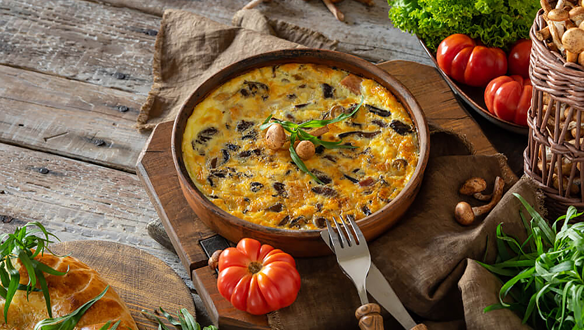 Frittata in a skillet with fork
