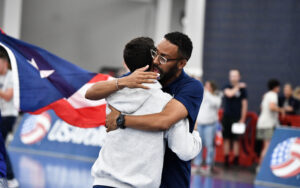 coaches hugging