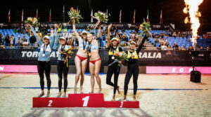 Women's beach volleyball teams on the podium