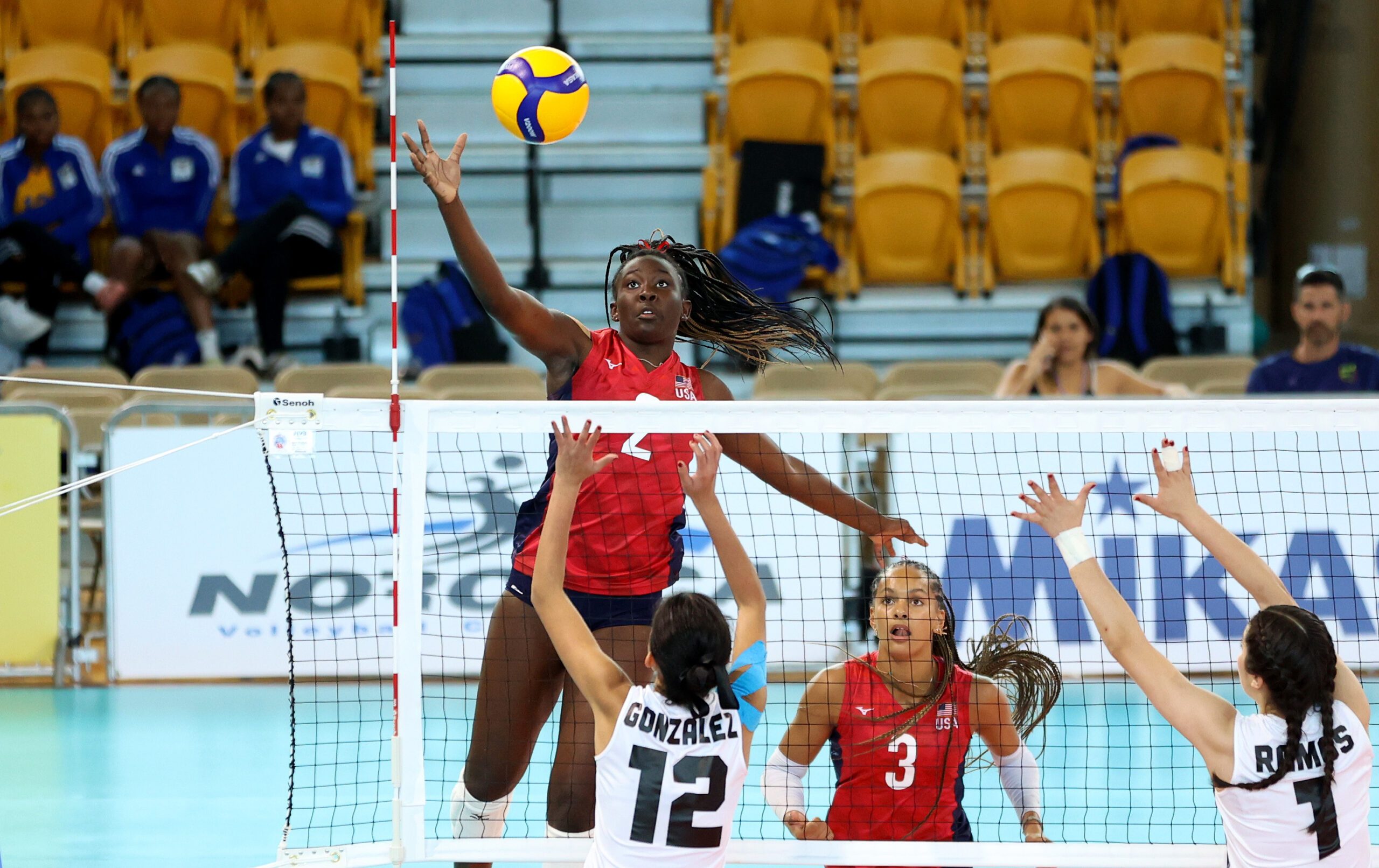 Jaela Auguste hits in the Pan Am Cup match vs. Mexico