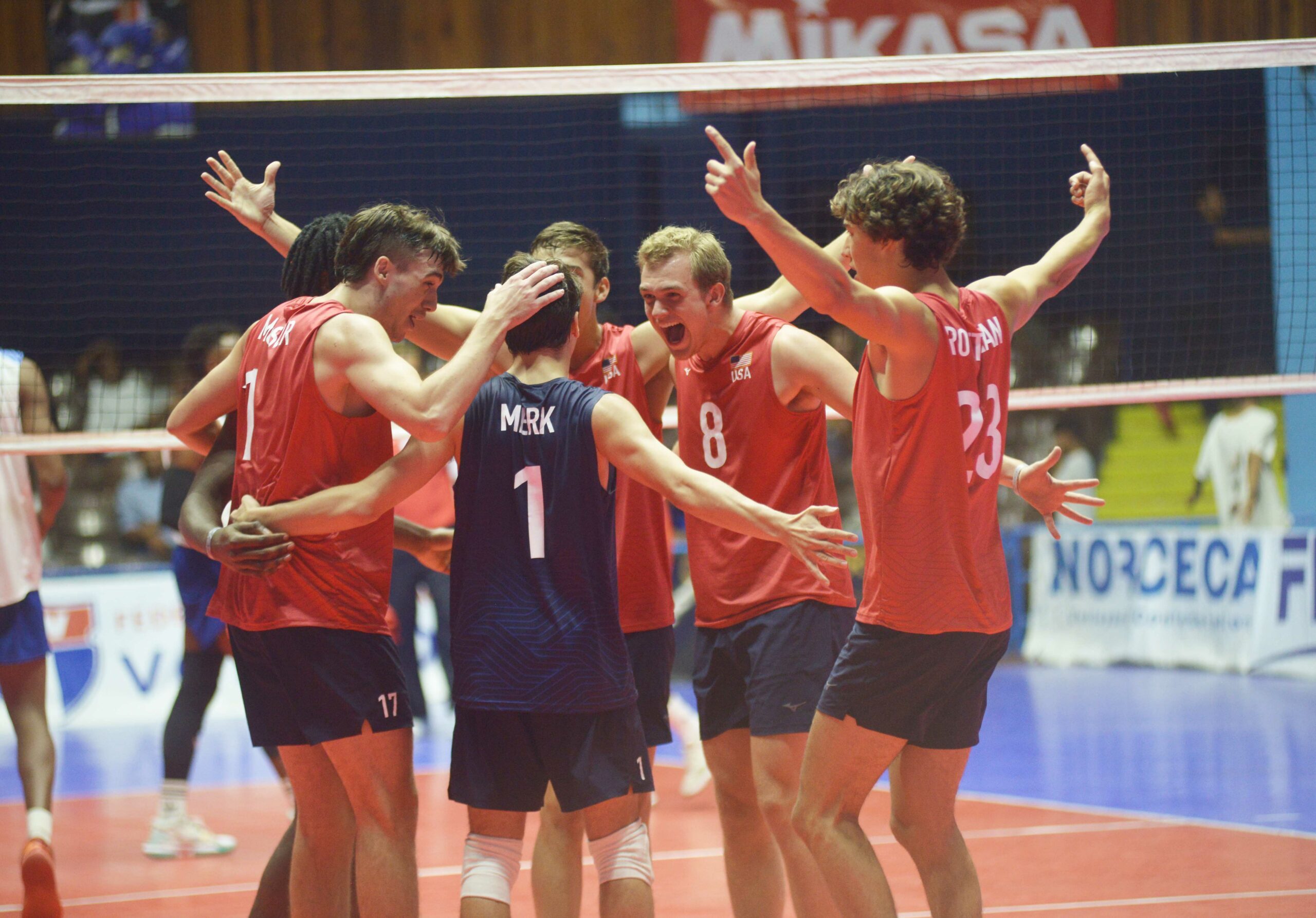 US celebrating point during Gold Medal match vs. Cuba.
