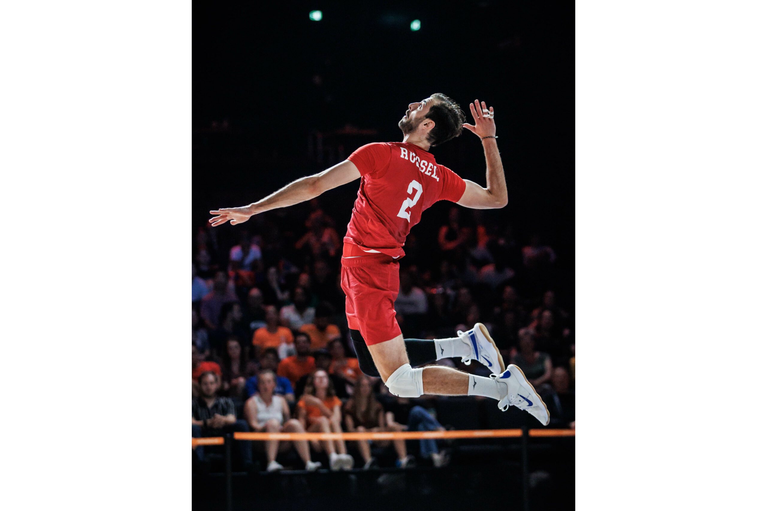 Aaron Russell of USA serving.