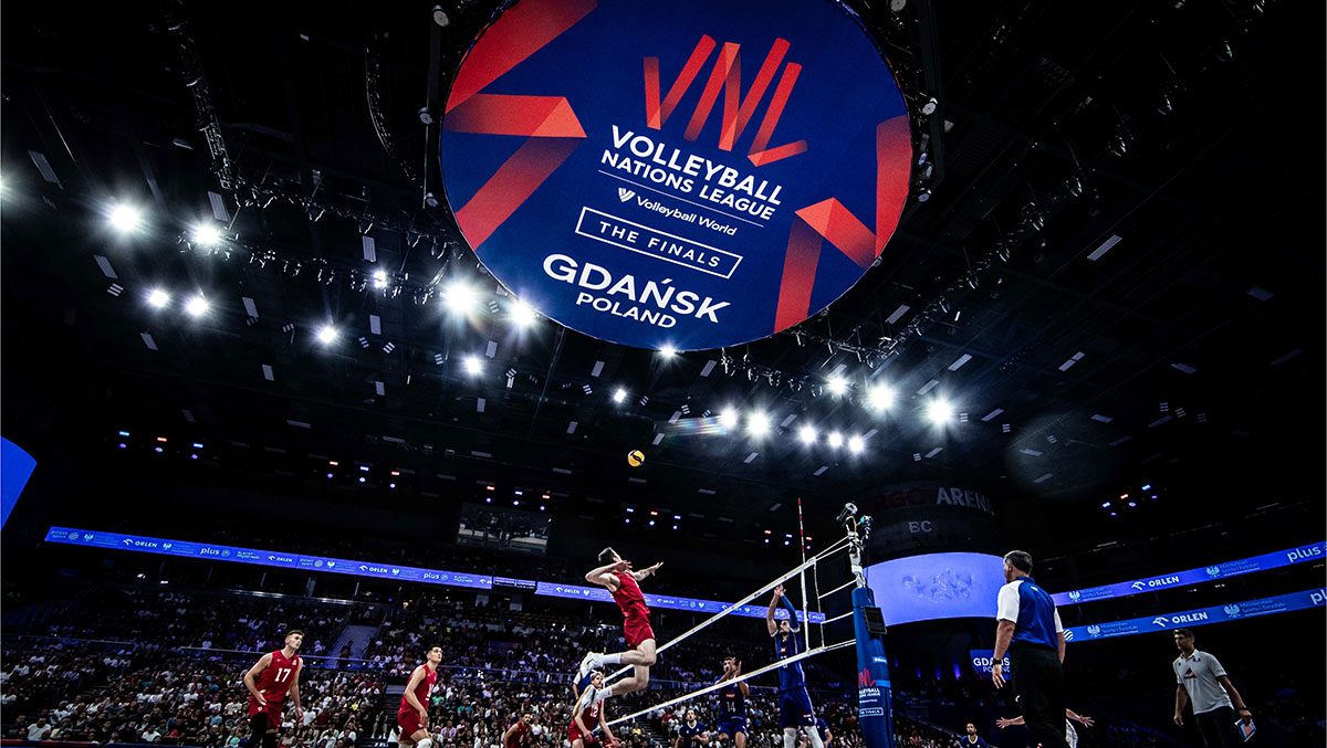 A U.S. men's volleyball player leaps to attack the ball
