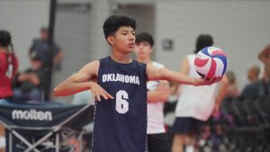 A boy from Oklahoma Region prepares to serve