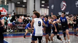 Boys celebrate on the court