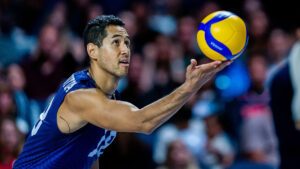 Garrett Muagututia serves