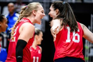 Kathryn Plummer and Dana Rettke celebrating point.