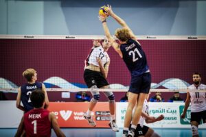 Marc Smith of Men's U21 with block against Belgium.