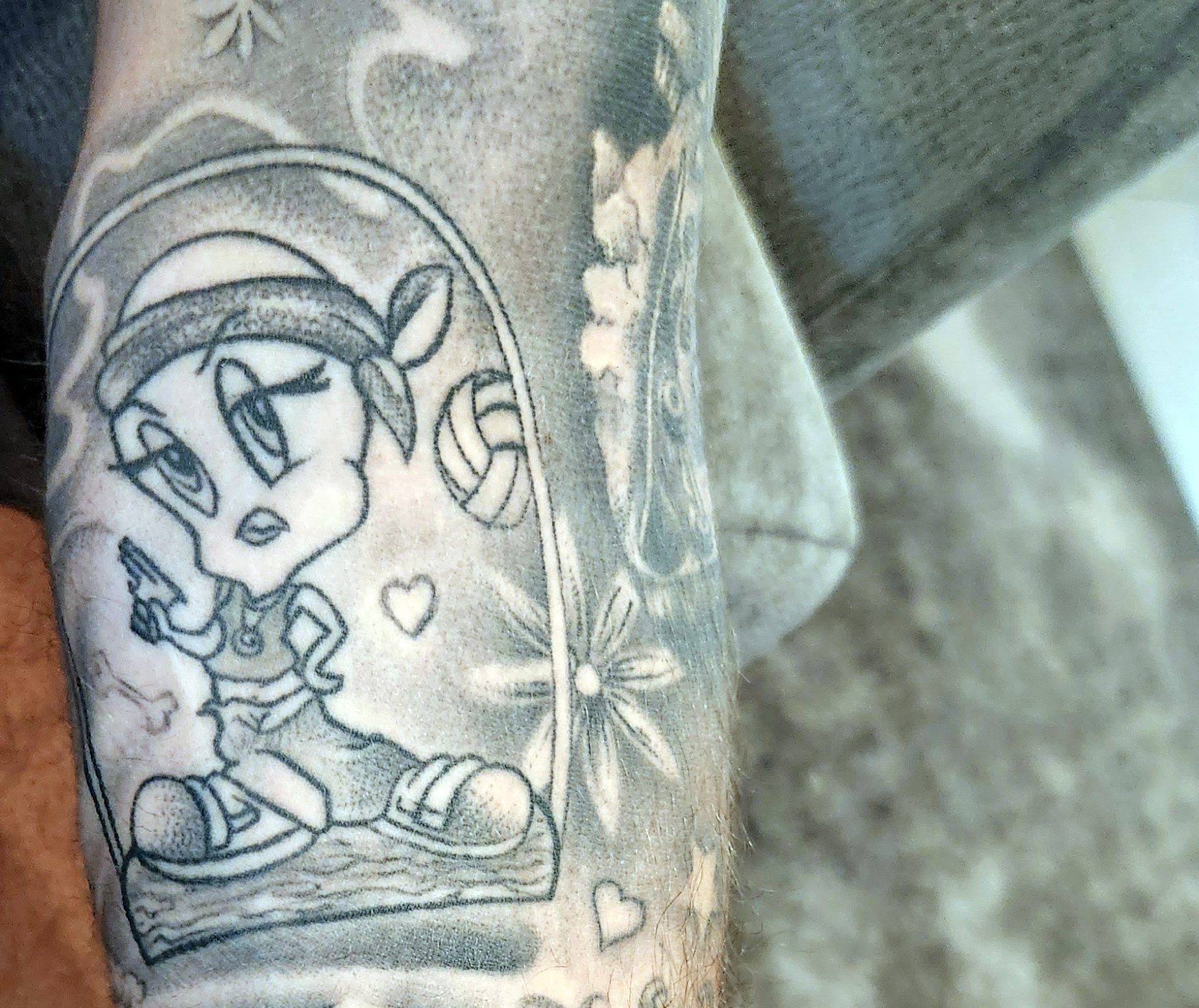 Photo of tattoo of cartoon character Tweety Bird
