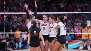 Nebraska team in a uddle