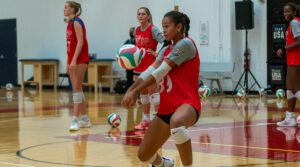 Indoor NTDP girls player receives the ball