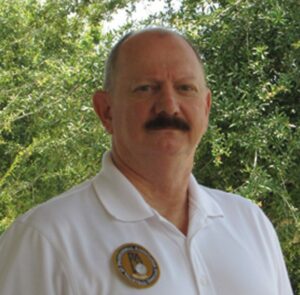 A headshot of Dave Greenlee