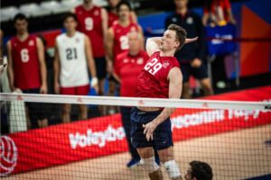 Photo of U.S. outside hitter Jordan Ewert attacking against France at the 2024 Volleyball Nations League.