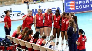 Members of the 2023 Girls U19 National Team huddle during a timeout with their coaches