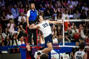 Photo of U.S. outside hitter Ethan Champlin attacking against Türkiye at the 2024 Volleyball Nations League.