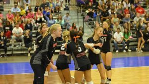 Girls celebrating on the court