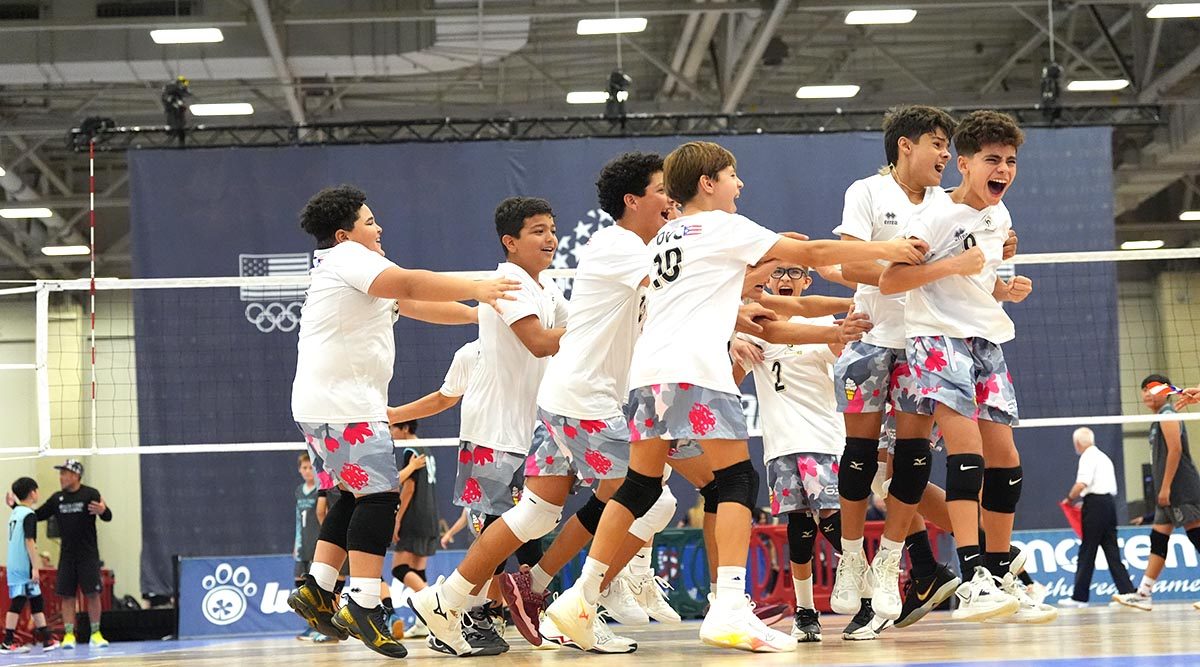 boys celebrate on the court