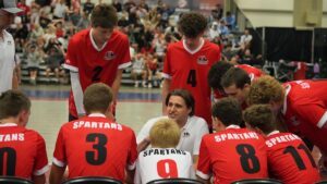 Boys talk to a coach