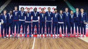 U.S. Men pose wearing gold medals