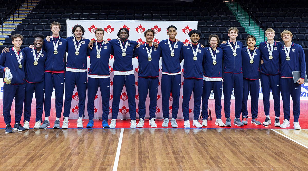 U.S. Men pose wearing gold medals