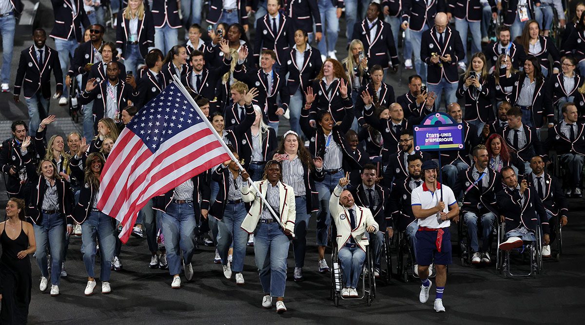 Nicky Nieves leads the U.S. delegation into the 2024 Paralympic Opening Ceremony - 2024 Getty Images