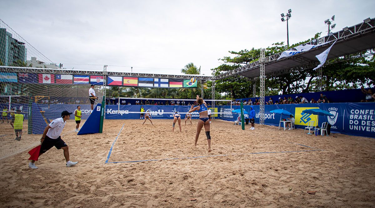 Beach volleyball players competing at the 2022 World University Championship