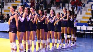 The girls u19 team lines up for the national anthem