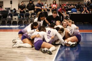 Arizona Storm dogpiles on the court after winning 18 Open