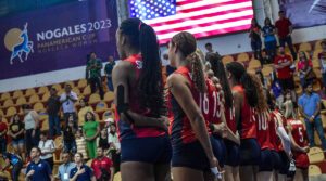 A U.S. women's team stands for the national anthem