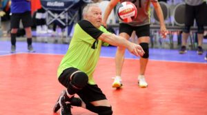 A man digs a ball