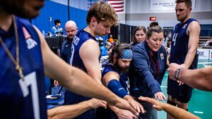 The U.S. men's sitting team in a huddle