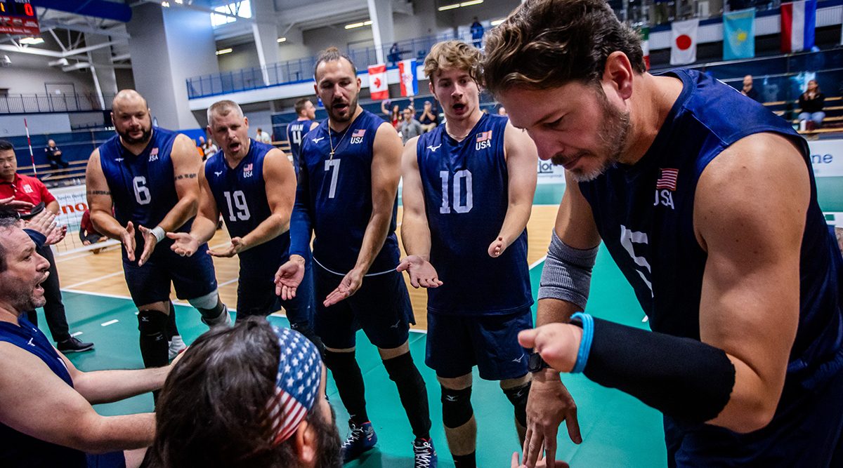 Brett Parks, Robbie Gaupp, Robbie Onusko cheer on the starters