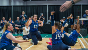 Emma Schieck, Kaleo Kanahele Maclay, Monique Matthews and Nicky Nieves celebrate